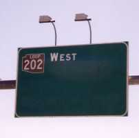 [Mostly blank AZ 202 overhead sign]